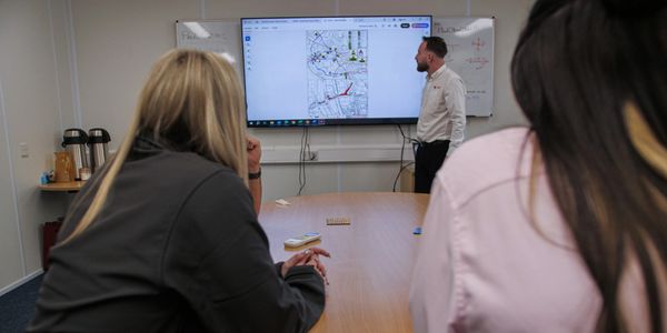 Staff in Meeting Room  - Highway Assurance Ltd