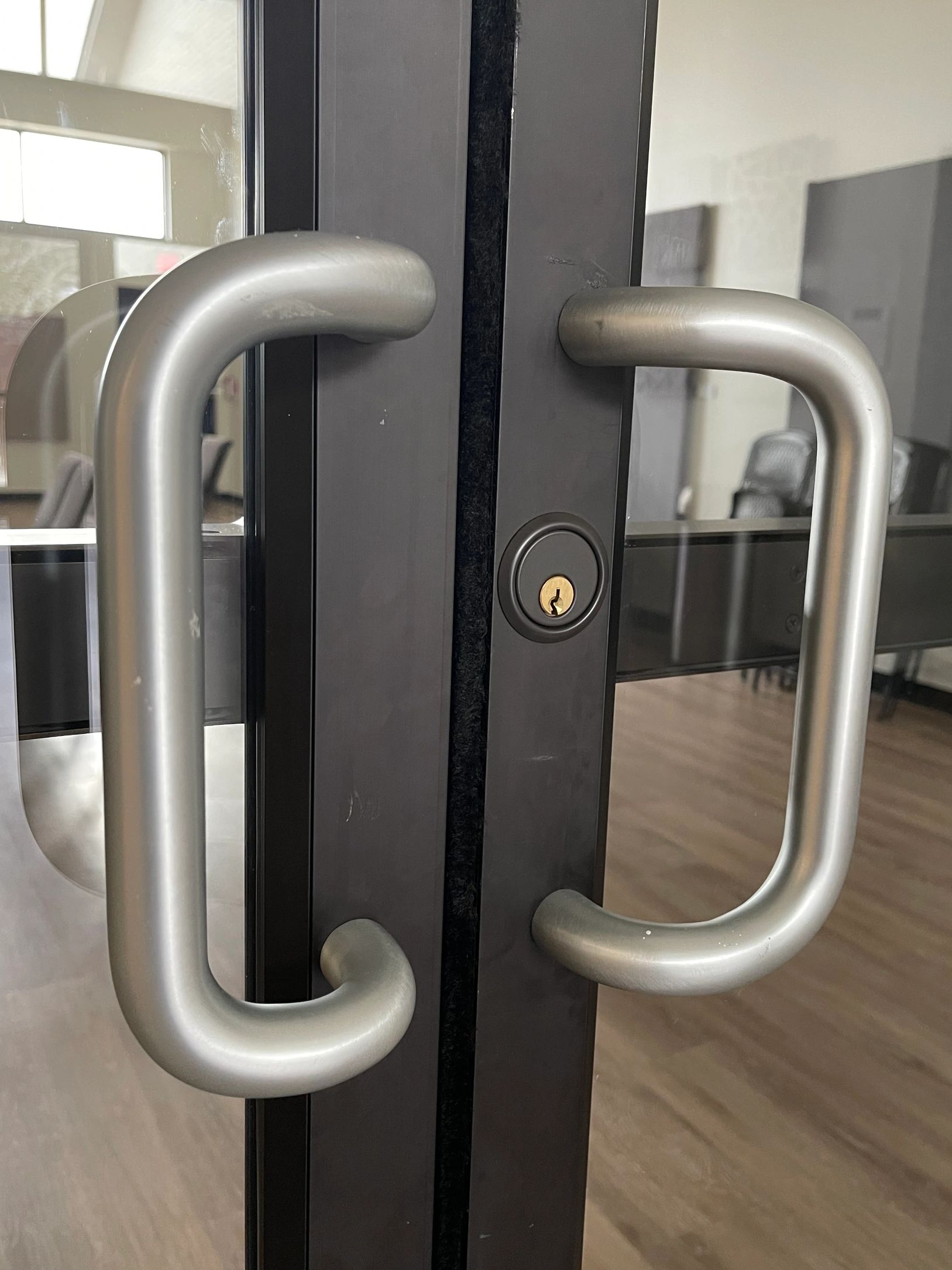 Commercial storefront door lock and hardware