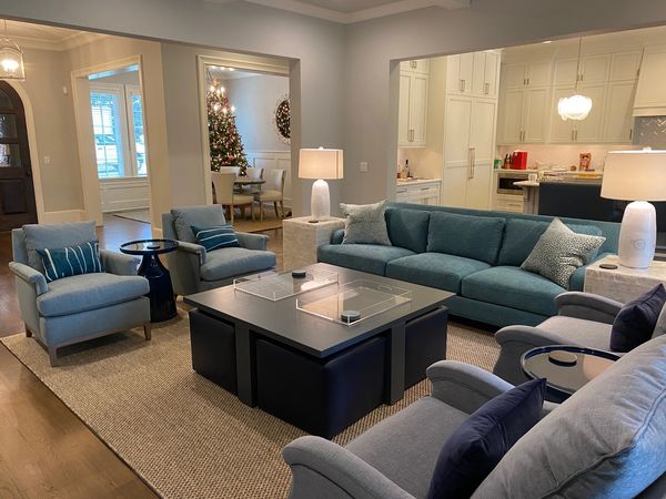 Coffee table with pull out ottomans