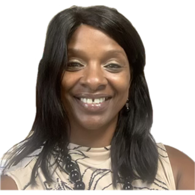 Smiling woman with long dark hair and a patterned top.
