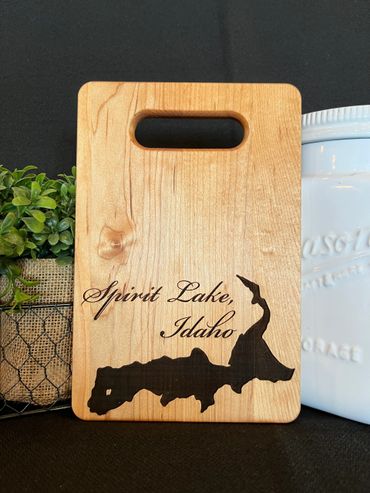 Maple cutting board with Spirit lake Idaho on it