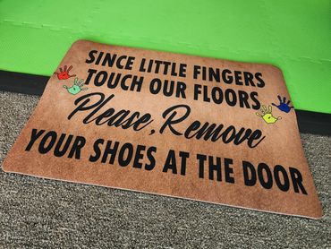 No shoes socks only sign at Poppets