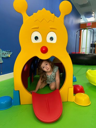 Girl playing at Poppets Play Place Indoor playground West Knoxville Farragut