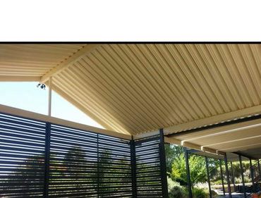 Aluminum slats and gable patio roof and deck by Structural Design Carpentry in Shellharbour Illawarr