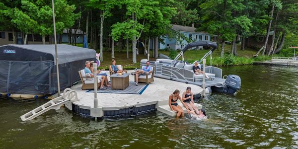 Wave Armor floating dock system with patio, PWC ports and accessories - Lake of the Woods.