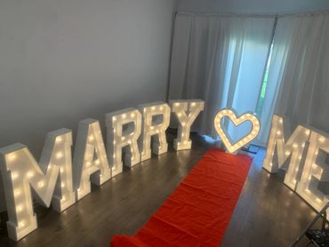 Marry me marquees
Marry me light up letters
Proposal
Proposal ideas
Party decor