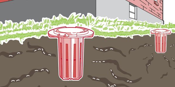 Illustration of soil injection ports near a building foundation to control termites.