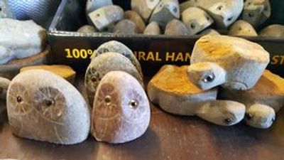 rock owls, rock turtles, stone creations