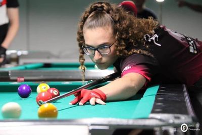 Pro pool player April Larson enjoyed her visit to Jointed Cue where she played a $10k money match in