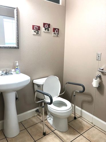 Private half bathroom at Suncrest Adult Care Home in West Linn. Suncrest Ach.