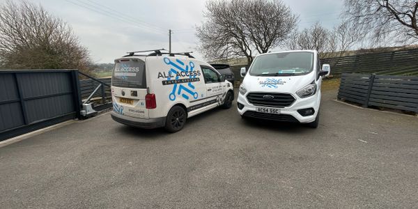 The All access entry vehicles in front of one of their automatic electric gates in wetherby