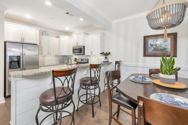Bar seating along with dining room table that expands to seat 6!