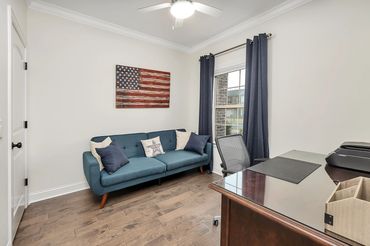 Office with desk, printer, sofa bed and closet. Can be used as a bedroom in a pinch or for a child's