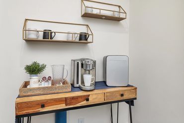 Coffee bar for overnight guests to enjoy while watching the morning news in the upstairs den.