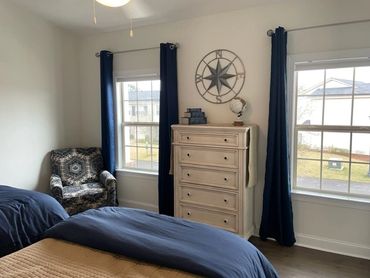 Second floor bedroom with two full size beds.
