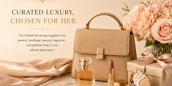 Luxury handbag, perfume, and lipstick arranged with roses and gift box.