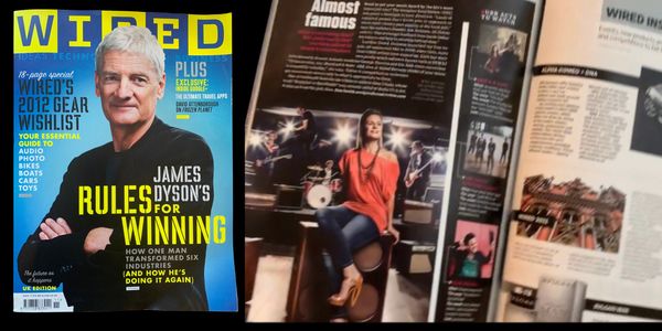 WIRED magazine cover with James Dyson, and an inside spread featuring a woman in a red top.