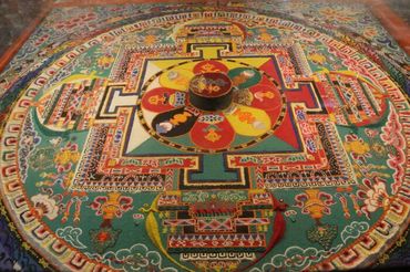 Sand Mandala, which is a Tibetan Buddhist tradition involving creation and destruction