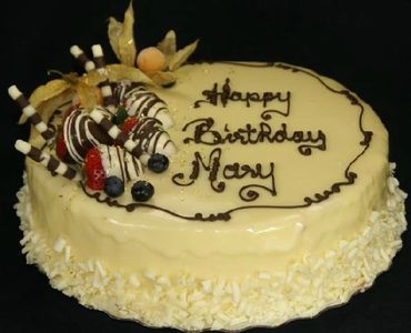 Signature White Chocolate Raspberry, With "special Decoration including gold flake"
makes an impact!