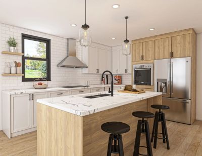 Modern kitchen with white cabinets, wood accents, and a marble island.