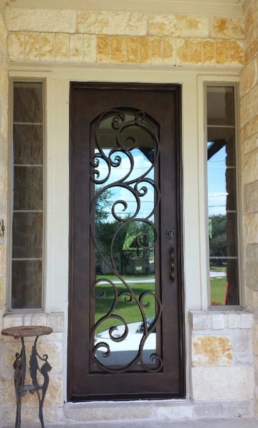 Single Wrought Iron Door and small windows