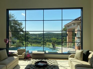 Window walls that shows the pool area