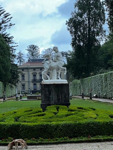 Garden Statue with estate in the background. Camino del Norte, Spain