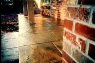 Decorative Stamped Concrete In Sunrise beach A the Lake of The Ozarks. Front porch and sidewalk conc