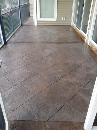 Condo Deck Concrete resurfacing at the lake of the ozarks by RockSolid Custom Concrete