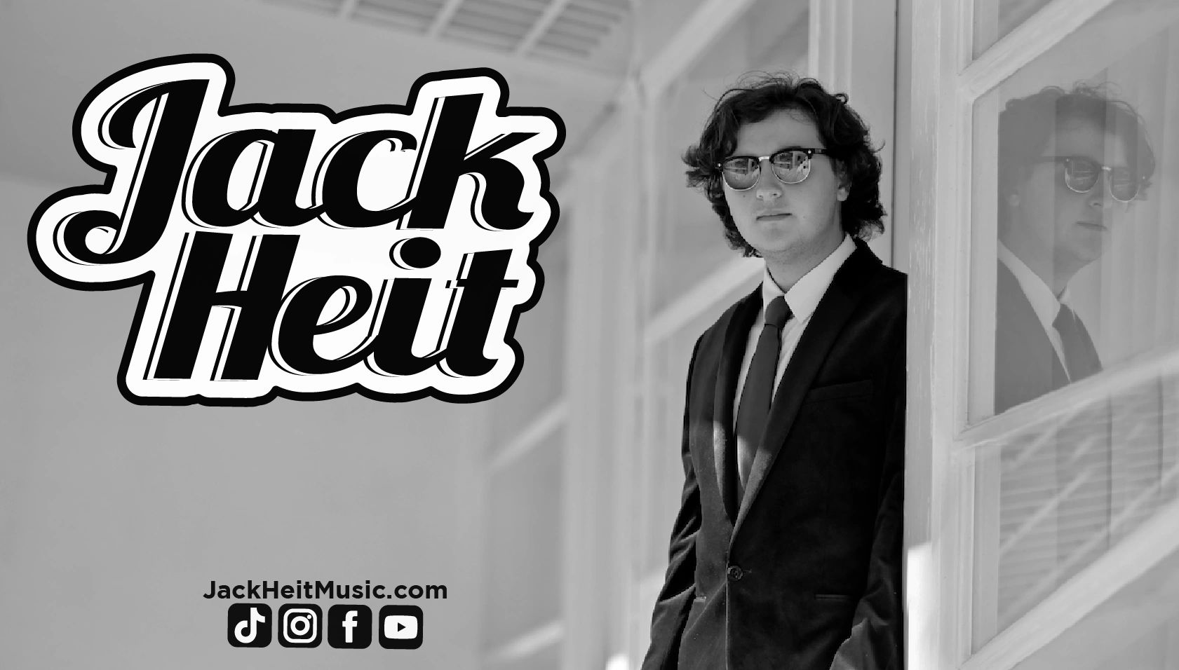 Jack Heit, suit, reflection, cover photo.Musician, Singer, Songwriter.