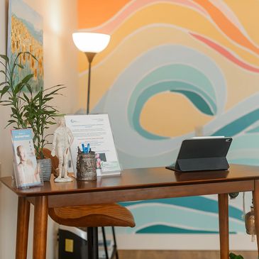 Soothing colors and sounds great you in the reception area to Wellstream Healing & Acupuncture.