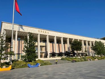 Tourists meet at  Tirana Opera House, to explore Tirana on the Free Walking Tour. #FreeTourTirana