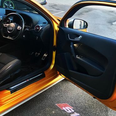 Door shuts wrapped Audi