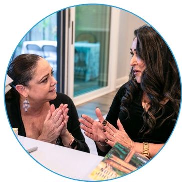 Traycee talking to a woman