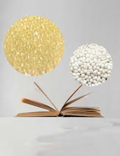 Open book with floating bubbles above it.