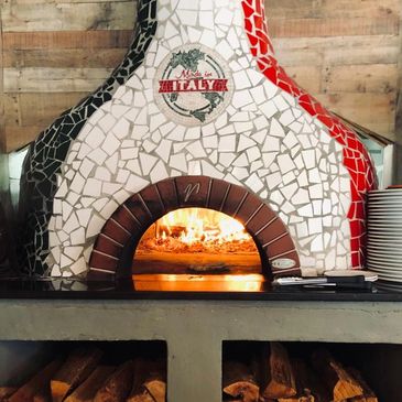 Enjoy Neapolitan-style pizza in our magnificent wood-fired oven, imported from Italy.