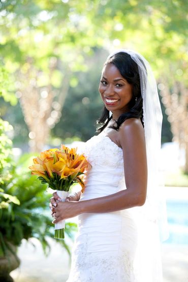 Glowly bridal makeup with a red lip