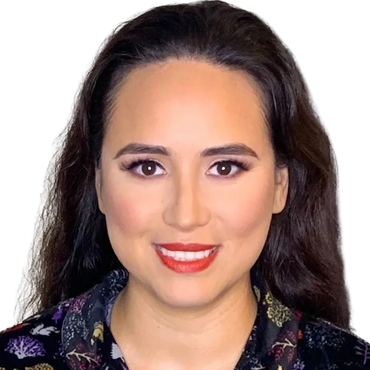 A hispanic woman wearing a natural glam with contour and a bold red lip for a night out in Austin.