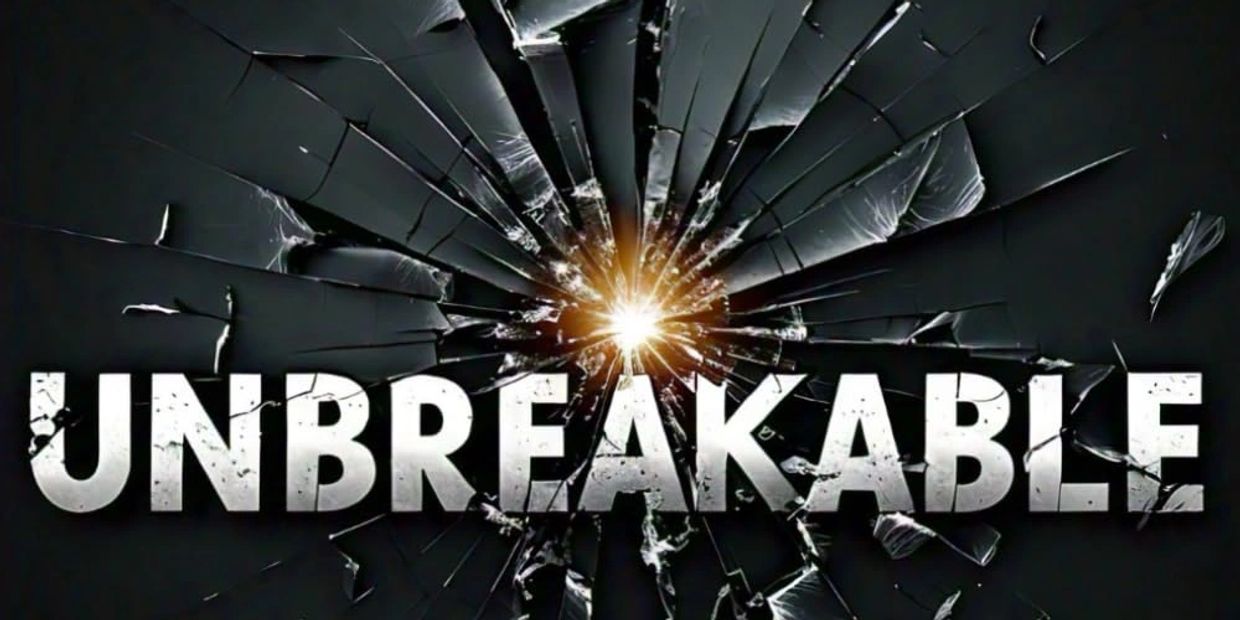 The word 'UNBREAKABLE' with shattered glass effect behind it.