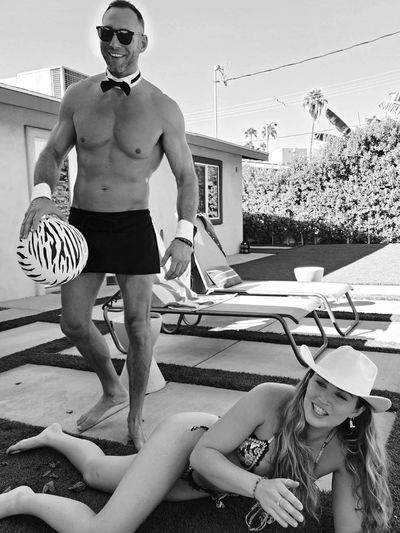 Party butler in Scottsdale hosts wild party games during a bachelorette pool party in the summer.