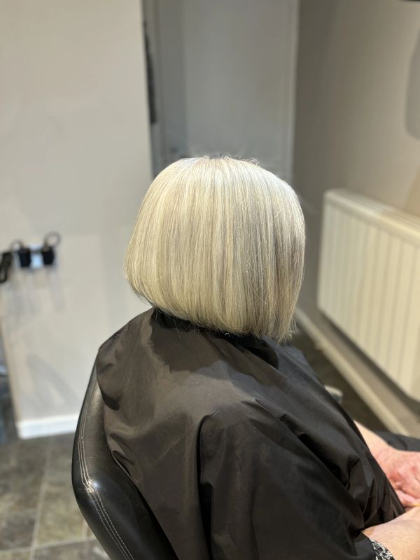 A classic women's bob in a pale silver grey colour.