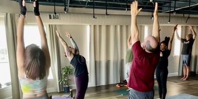 Yoga Class, students practicing Yoga.
