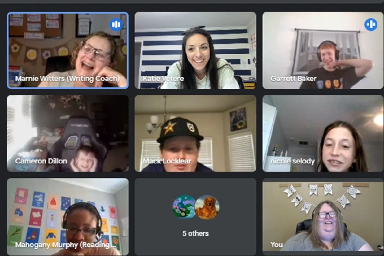 A lively virtual meeting with eight participants engaged and smiling.