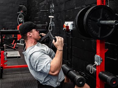 Plate-loaded cable machines