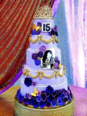 Handmade Sugar Flowers and fondant accents on Buttercreme