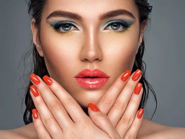 Beauty woman with fresh dip powder nails