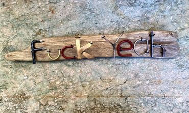 Fuck Yeah! Lowercase letters in scrap on driftwood for when only exuberant agreement will do, Made o