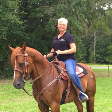 Sheila Frierson owner of her Quarter Horse Stallion, Shining Joker