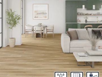 Modern living room and kitchen with wooden flooring.