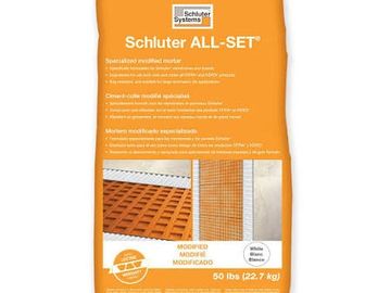Bag of Schluter ALL-SET mortar for tile installation.